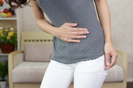 Woman who has a stomachacheの写真素材