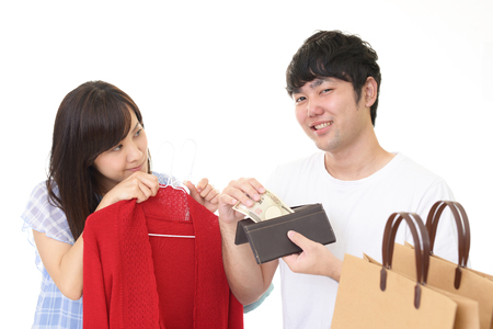 Young couple with shopping bagsの写真素材