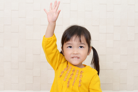 Happy little Asian girl smileの写真素材