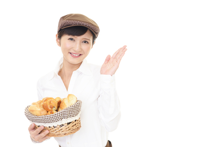 A smiling female bakerの写真素材