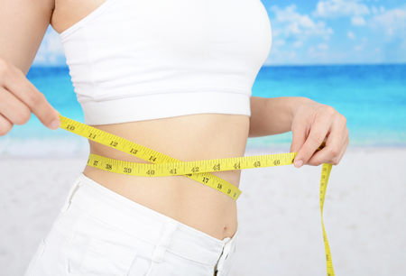 Woman who is measuring her waistの写真素材