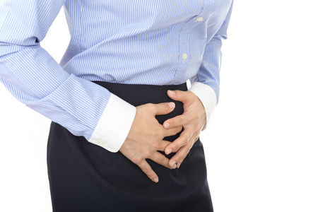 Woman who has a stomachacheの写真素材