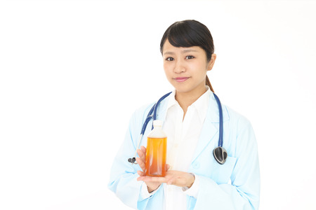 Smiling Asian medical doctorの写真素材
