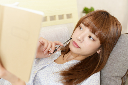 Woman with a notebookの写真素材