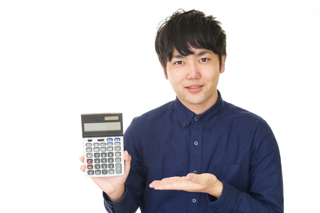 Man with a calculatorの写真素材