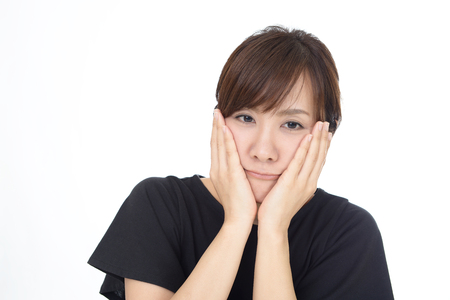 Woman who is worriedの写真素材