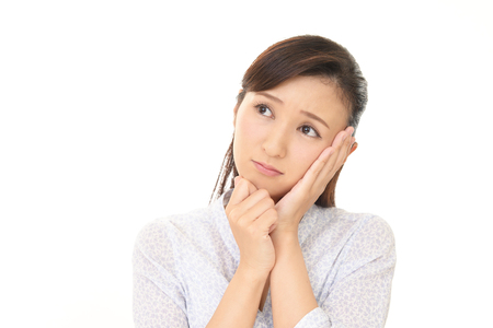 Woman who is worriedの写真素材