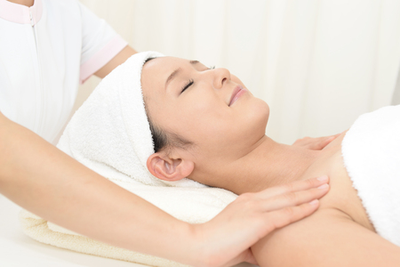 Woman getting a body massageの写真素材