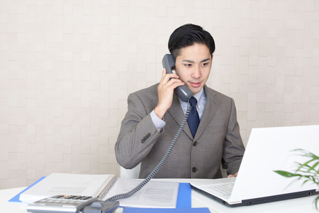 Working Asian businessmanの写真素材