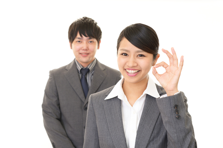 Smiling businessman and businesswomanの写真素材