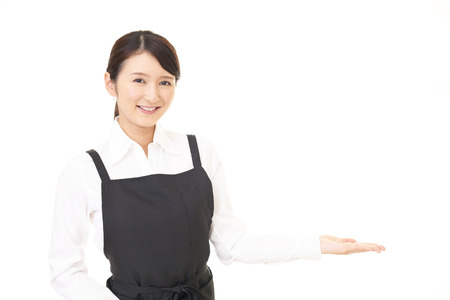 A smiling waitressの写真素材