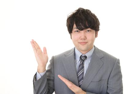 Businessman shows the wayの写真素材