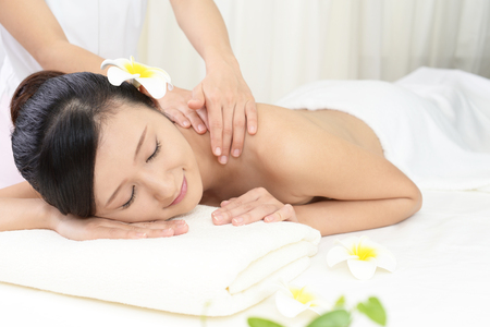 Woman getting a body massageの写真素材