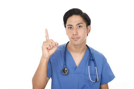 Asian medical doctor pointingの写真素材
