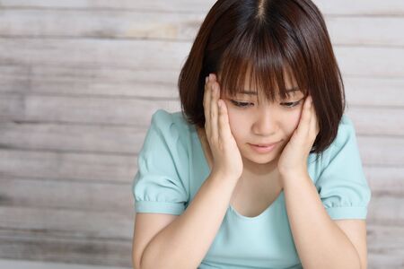 Young woman in depressionの写真素材