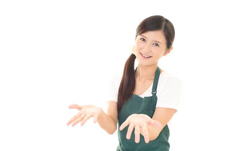Smiling woman in apronの写真素材