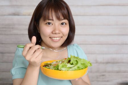 Woman who enjoys a mealの写真素材