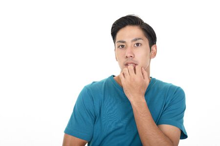 Uneasy Asian manの写真素材