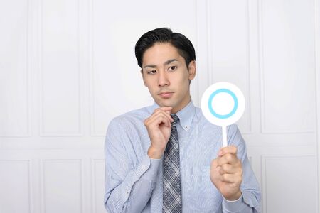 Businessman with a Yes signの写真素材