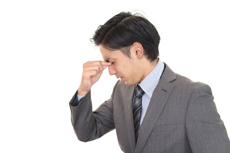 Very disappointed man isolated on white backgroundの写真素材