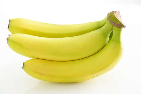 A bunch of bananas on white background.の写真素材