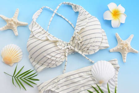 Fashion woman swimsuit and sea shells.の写真素材