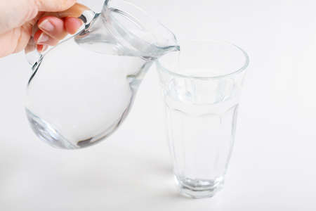 Jug and glass with water.の写真素材