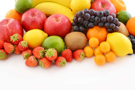 Delicious and fresh variety fruits on white background.の写真素材
