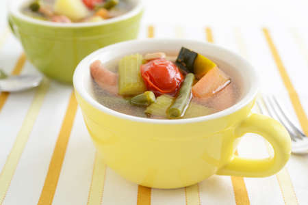 Delicious vegetable soups in mugs.の写真素材
