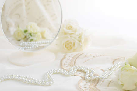 Stylish makeup mirror and fashionable accessories.の写真素材