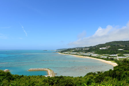 Beautiful beach with blue sky and white cloud in Okinawa, Japanの写真素材