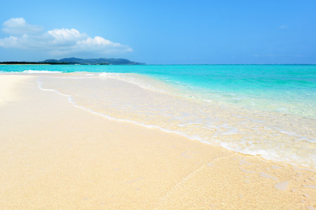 Beautiful tropical beach with turquoise water and white sand in Okinawaの写真素材