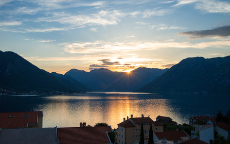 Beautiful sunset at bay of Kotor. Mountains and the seaの写真素材