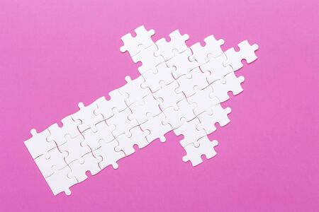 White details of puzzle on pink background Concept success of business - Imageの写真素材