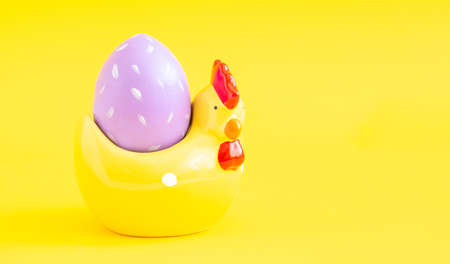 Easter greeting card with decorative chicken and painted egg. Easter concept. Copy space - Imageの写真素材