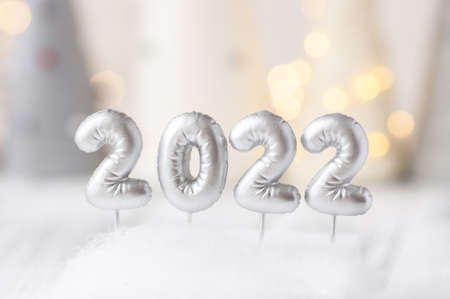 Silver numbers 2022. Bokeh effect on background. New year celebration. Happy New Year conceptsの写真素材
