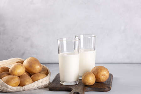 Dairy-free potato drink in glasses. Plant-based alternative milk - Imageの写真素材