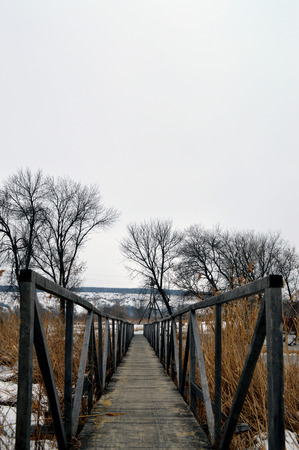 Wooden bridge cross the riverのeditorial素材