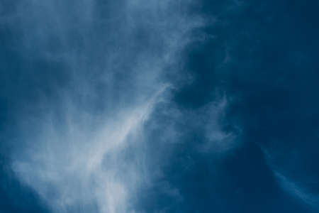 Beautiful blue sky with clouds. Sky clouds background. Fluffy white cloud formation in a beautiful blue sky. Bird's-eye view. Nice wallpaper. Summer day.の写真素材