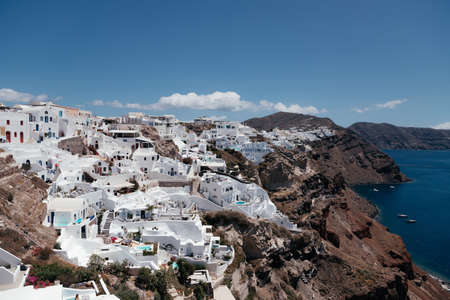 White architecture on Santorini island with view on the sea, Oia, Greece. Summer vacation and holiday concept, luxury travel. Wonderful scenery, cruise ships and white architecture. amazing sceneryの写真素材