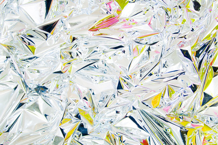 Bright background from metallic foil. Holographic effect. Back in the 80s 90s