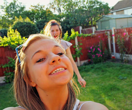 happy teenage girl friends の写真素材