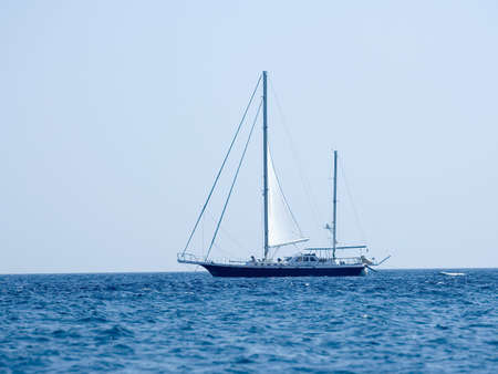 Sailing boat on the open sea