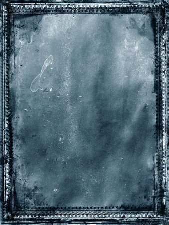 Computer designed grunge border and aged paper backgroundの写真素材