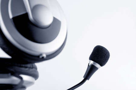 Headphones with microphone on white background