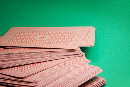 Deck of cards on green tableのeditorial素材