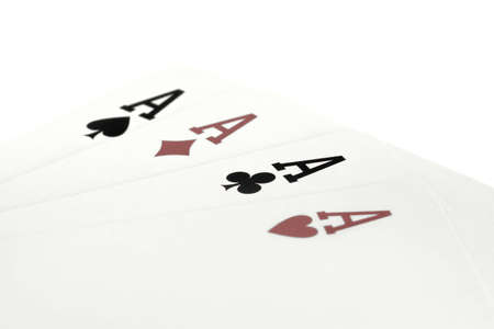 Four aces isolated on white background , retro style toned photoの写真素材