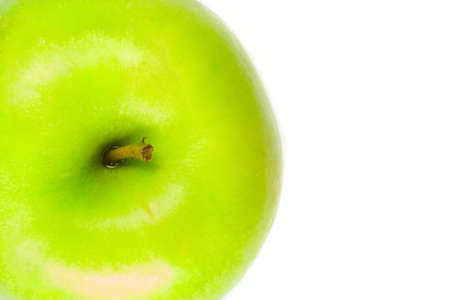 Fresh tasty green apple on white background close up photoの写真素材
