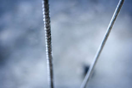 Rope above the water , shallow DOF photoの写真素材