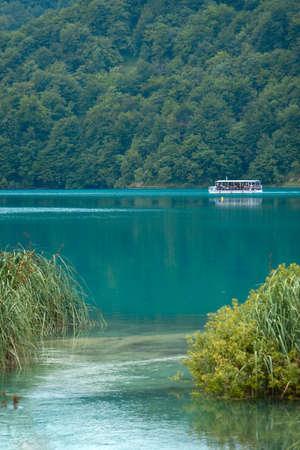 Beautiful landscape of a green lakeの写真素材